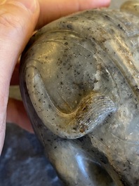 A Chinese grey-speckled celadon jade elephant, Qing