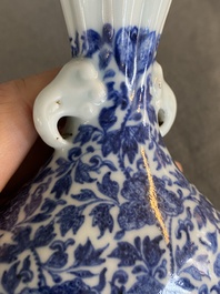 A Chinese blue and white Ming-style vase with floral design, probably Qianlong