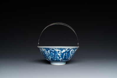A Chinese blue and white 'eight immortals' bowl with silver handle, Qianlong mark and of the period