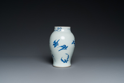 A Chinese blue and white vase with birds among blossoming branches, Chongzhen