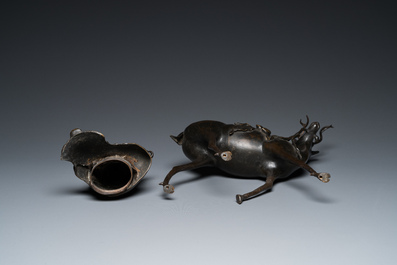 A large Chinese bronze 'Shou Lao on deer' censer, 19th C. or earlier