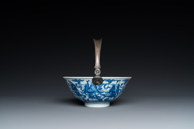 A Chinese blue and white 'eight immortals' bowl with silver handle, Qianlong mark and of the period