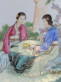 A Chinese famille rose dish with ladies playing go, signed Wanglong Fu 王隆夫, dated 1954