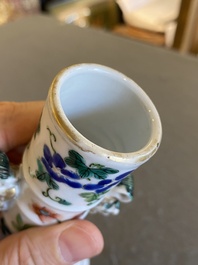A Chinese famille rose '18 Luohans' bottle vase, 19th C.