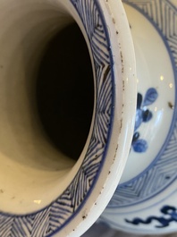 A large Chinese blue and white rouleau vase with floral design, Kangxi