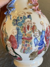 A Chinese famille rose '18 Luohans' bottle vase, 19th C.