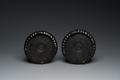 A Chinese famille rose rouleau vase and a pair of jardini&egrave;res, 20th C.