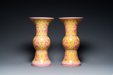 A pair of Chinese puce-enamelled yellow-ground 'gu' vases with dragons, Jia Xu Nian Zhi 甲戌年製 mark, dated 1874