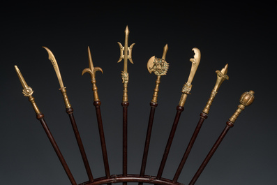 A Vietnamese wooden weapon rack with decorative weaponry, 19/20th C.