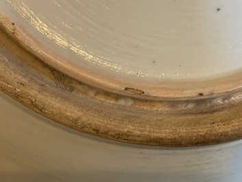 A pair of large Chinese pink-ground famille rose 'dragon and phoenix' dishes, 19th C.