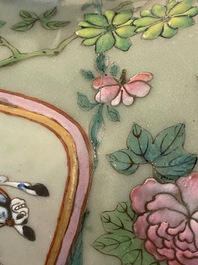A pair of Chinese famille rose celadon-ground vases, 19th C.