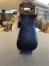 A Chinese monochrome dark aubergine-glazed 'fanghu' vase, probably Qianlong