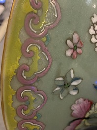 A pair of Chinese famille rose celadon-ground vases, 19th C.