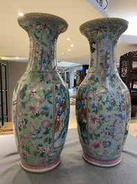 A pair of Chinese famille rose celadon-ground vases, 19th C.