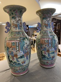 A pair of Chinese famille rose celadon-ground vases, 19th C.