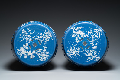 A pair of Chinese white slip-decorated blue-ground garden seats, 19th C.