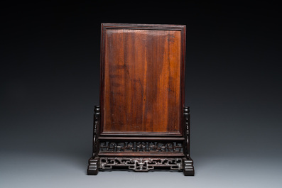 A Chinese famille rose plaque mounted as a table screen, Qianlong
