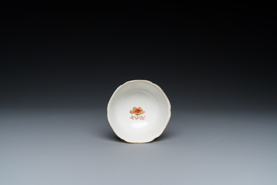 A Chinese grisaille and gilt 'roosters' cup and two saucers, Yongzheng