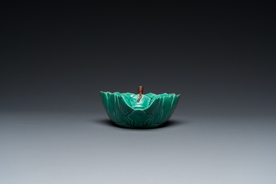 Three Chinese leaf-shaped brush washers in blue and white, blanc de Chine and sancai enamels, 18/19th C.