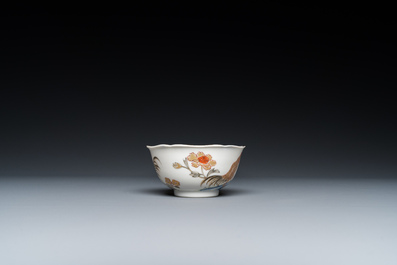 A Chinese grisaille and gilt 'roosters' cup and two saucers, Yongzheng
