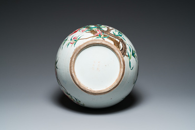 A Chinese famille rose 'nine peaches' bottle vase, Qianlong mark, 19th C.