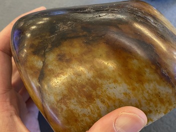 A Chinese hollowed jade libation cup on wooden stand, probably Qing
