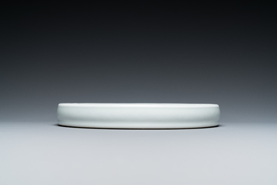 A Chinese white-glazed anhua-decorated ink stone, Qing