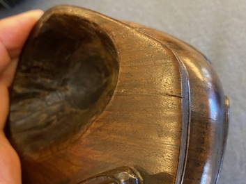 A Chinese hollowed jade libation cup on wooden stand, probably Qing