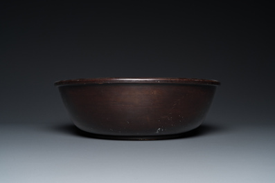 A large Chinese Fuzhou or Foochow lacquer 'tiger' bowl, inscribed 'xin qi chun', 19/20th C.