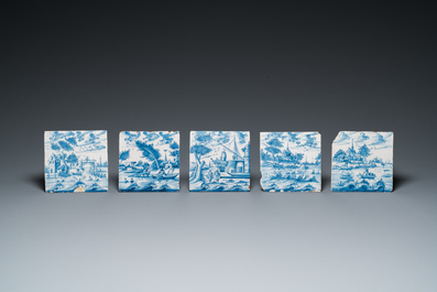 25 blue and white Dutch Delft tiles with continuous landscape scenes, 18th C.