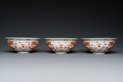Three Chinese famille rose 'dragon' bowls, Qianlong mark, 19/20th C.