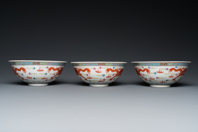 Three Chinese famille rose 'dragon' bowls, Qianlong mark, 19/20th C.