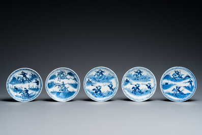 13 Chinese blue and white 'rabbit hunt' cups and 10 saucers, Qianlong mark, 19th C.