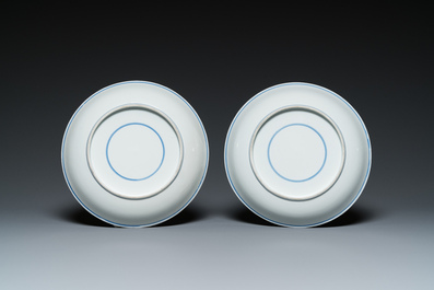 Two Chinese blue and white 'clouds' dishes and three plates, 19th C.