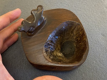 A Chinese hollowed jade libation cup on wooden stand, probably Qing
