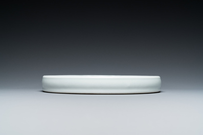 A Chinese white-glazed anhua-decorated ink stone, Qing