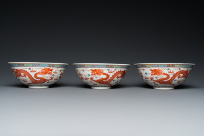 Three Chinese famille rose 'dragon' bowls, Qianlong mark, 19/20th C.