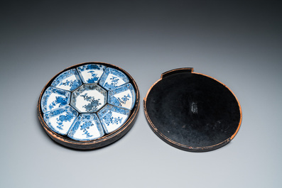 A Japanese blue and white Arita nine-piece sweetmeat set in its original lacquer box, Edo, 17/18th C.