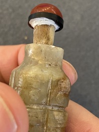 A Chinese celadon and russet jade 'cong' snuff bottle, probably Qing