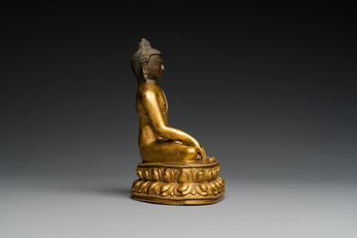 A Sino-Tibetan gilt bronze Buddha, 18th C.