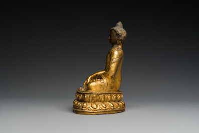 A Sino-Tibetan gilt bronze Buddha, 18th C.