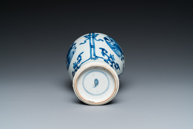 A Chinese blue and white 'cranes' vase and a pair of plates, Kangxi