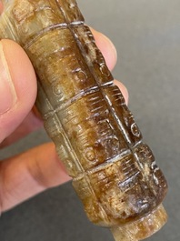 A Chinese celadon and russet jade 'cong' snuff bottle, probably Qing