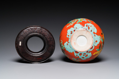 A Chinese relief-decorated alms bowl with wooden lid, Qianlong mark, 19/20th C.