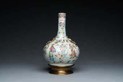 A Chinese Canton famille rose vase with gilt brass mounts, 19th C.