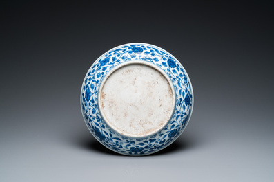 A Chinese blue and white 'lotus scroll' dish, Qianlong