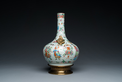 A Chinese Canton famille rose vase with gilt brass mounts, 19th C.