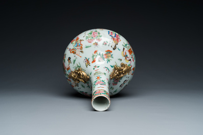 A Chinese Canton famille rose vase with gilt brass mounts, 19th C.