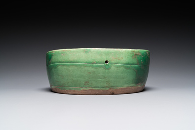 A Chinese sancai 'mandarin ducks' pillow, possibly Dangyangyu kilns, Henan, Song or later