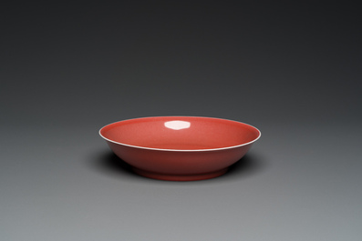 A Chinese monochrome copper-red plate, Zhong Guo Jing De Zhen Zhi 中國景德鎮製 mark, dated 1954